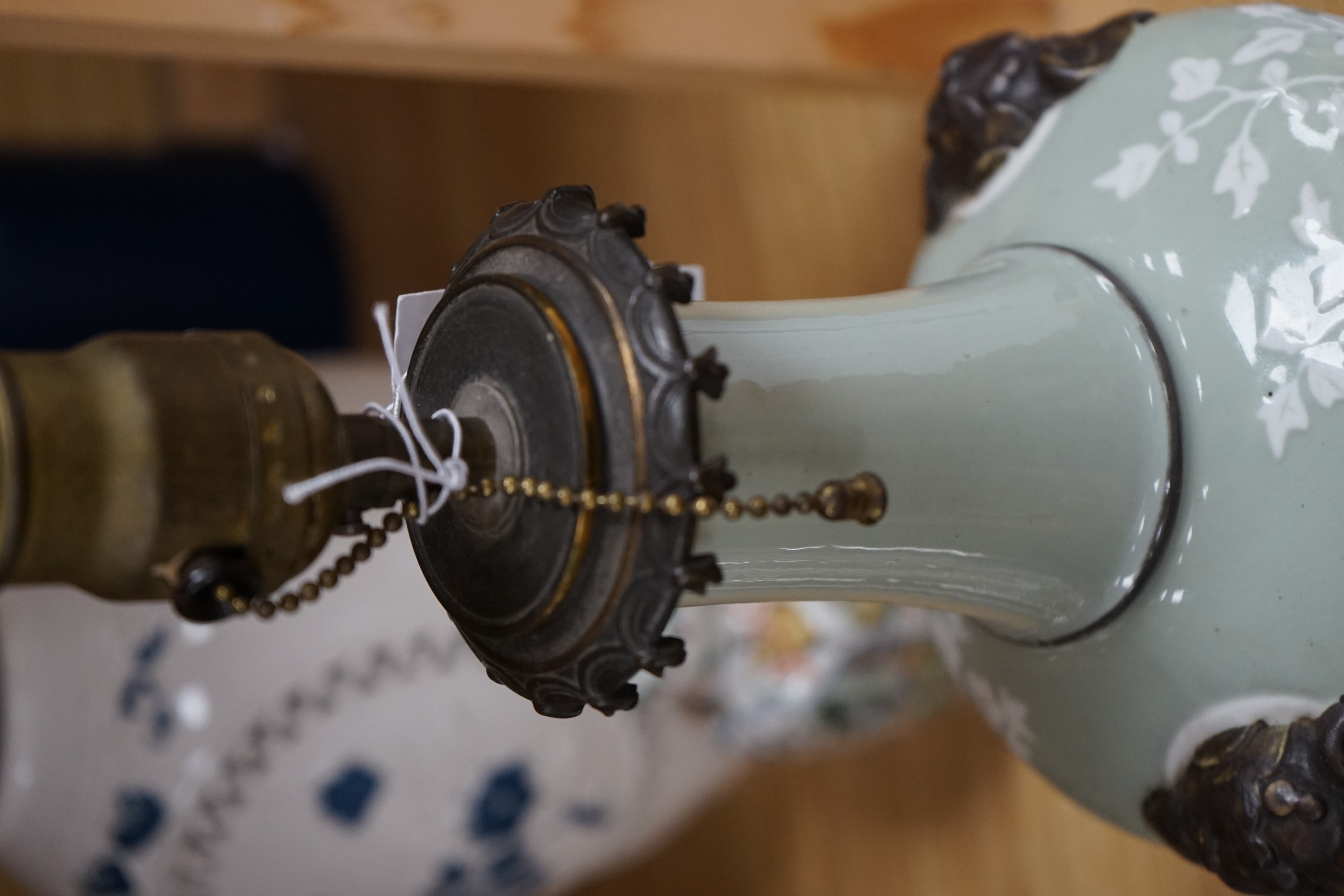 Four Chinese porcelain vases, one mounted as a lamp, 35cm